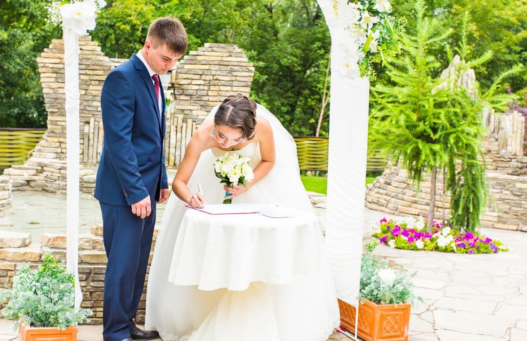 Wedding officiant in Winnipeg delivering a customized ceremony script for couple